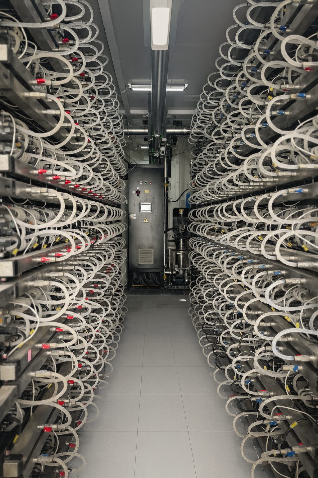 Server room with liquid cooling hoses